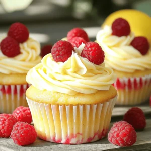To make Raspberry Lemonade Cupcakes, gather these key ingredients: - 1 ½ cups all-purpose flour - 1 teaspoon baking powder - ½ teaspoon baking soda - ¼ teaspoon salt - ½ cup unsalted butter, softened - 1 cup granulated sugar - 2 large eggs - 2 teaspoons lemon zest - 1 teaspoon vanilla extract - ½ cup buttermilk - ½ cup fresh raspberries (plus extra for garnish) - 1 tablespoon lemon juice Each ingredient plays a vital role in the flavor and texture of the cupcakes. The flour provides structure, while the butter adds richness. Fresh raspberries bring a burst of flavor that pairs perfectly with lemon. Here are some handy conversions to help you out: - 1 cup = 240 ml - 1 tablespoon = 15 ml - 1 teaspoon = 5 ml These conversions help ensure you get the right measurements. Accurate measurements lead to better baking results. When picking fresh ingredients, look for these tips: - For raspberries, check for bright color and firmness. Avoid mushy ones. - Choose butter that is fresh and cold for creamy mixtures. - Select lemons that feel heavy for their size. This means they have more juice. Fresh ingredients make a big difference in taste. Always choose the best for your cupcakes. Start by gathering all your tools. You need a mixing bowl, an electric mixer, and a muffin tin. Line your 12-cup muffin tin with cupcake liners. This keeps cupcakes from sticking. Preheat your oven to 350°F (175°C). This step is key for even baking. Next, measure the dry ingredients carefully. You need 1 ½ cups of all-purpose flour, 1 teaspoon of baking powder, ½ teaspoon of baking soda, and ¼ teaspoon of salt. Mixing these dry items together helps the cupcakes rise perfectly. In a large mixing bowl, cream ½ cup of softened unsalted butter with 1 cup of granulated sugar. Use your electric mixer on medium speed. Mix for about 3-4 minutes until it looks light and fluffy. This step adds air, making your cupcakes soft. Now, add 2 large eggs, one at a time. Mix well after each egg. Then, stir in 2 teaspoons of lemon zest and 1 teaspoon of vanilla extract. These flavors give your cupcakes a bright taste. In a separate bowl, combine ½ cup of buttermilk and 1 tablespoon of lemon juice. Let it sit for a few minutes until it curdles. This will add moisture and flavor. Gradually add your dry mixture to the butter mixture. Do this while alternating with the buttermilk mix. Start and end with the flour mixture. Mix just until combined; over-mixing can make your cupcakes tough. Finally, gently fold in ½ cup of fresh raspberries. Be careful not to break them. You want those lovely raspberry pieces in your cupcakes. Now, it’s time to fill the cupcake liners. Divide the batter evenly among them, filling each about 2/3 full. This allows space for rising. Place the muffin tin in your preheated oven. Bake for 18-20 minutes. To check for doneness, insert a toothpick into the center. It should come out clean. Once baked, let the cupcakes cool in the pan for 5 minutes. Then, transfer them to a wire rack to cool completely. This helps them set and keeps the bottoms from getting soggy. After they cool, you can top them with whipped cream or lemon frosting. Add extra raspberries on top for a beautiful finish. Enjoy your delightful Raspberry Lemonade Cupcakes! When baking Raspberry Lemonade Cupcakes, avoid these common pitfalls: - Skipping the Room Temperature Ingredients: Make sure your butter and eggs are at room temperature. This helps them mix well. - Overmixing the Batter: Mix the batter just until combined. Overmixing can lead to dense cupcakes. - Not Measuring Properly: Use the correct measuring cups for dry and wet ingredients. This ensures the right texture and taste. To get light and fluffy cupcakes, follow these tips: - Cream Butter and Sugar Well: Beat the butter and sugar for 3-4 minutes. This adds air and makes your cupcakes rise. - Use Buttermilk: The acidity in buttermilk helps tenderize the batter. It gives your cupcakes a nice, moist texture. - Fold in Raspberries Gently: When adding raspberries, fold them gently. This keeps them whole and adds bursts of flavor. For perfect baking, stick to these guidelines: - Preheat Your Oven: Always preheat to 350°F (175°C) before baking. This ensures even cooking. - Check for Doneness: Bake for 18-20 minutes. Insert a toothpick in the center. It should come out clean when done. - Cool Properly: Let the cupcakes cool in the pan for 5 minutes. Then transfer them to a wire rack to cool completely. This helps them stay soft and not stick to the pan. {{image_2}} You can switch raspberries for strawberries. This change gives a new taste. Use the same amount of fresh strawberries. Chop them into small pieces. Mix them into the batter just like raspberries. You can also try blueberry lemonade or peach lemonade. Each fruit brings a fresh twist. If you need gluten-free cupcakes, replace the all-purpose flour. Use a gluten-free flour blend instead. Many brands work well for baking. Make sure it has xanthan gum for structure. Check labels to avoid gluten cross-contamination. The taste and texture will still be great! To make vegan cupcakes, swap the eggs for flax eggs. Mix 1 tablespoon of flaxseed meal with 3 tablespoons of water. Let it sit for a few minutes to thicken. Use plant-based butter instead of regular butter. For buttermilk, mix almond milk and vinegar. This keeps the cupcakes moist and flavorful. Each change keeps the delightful taste you love! After baking your Raspberry Lemonade Cupcakes, let them cool completely. Place them in an airtight container. This keeps them moist and fresh. If you have frosting on them, wait until the frosting sets. Use a layer of parchment paper to avoid sticking. Keep your cupcakes at room temperature for best flavor. If you have extra cupcakes, freezing is easy. First, let them cool. Wrap each cupcake tightly in plastic wrap. Then, put them in a freezer-safe bag or container. Label the bag with the date. Your cupcakes can stay fresh in the freezer for up to three months. To enjoy, thaw them in the fridge overnight. Frosted cupcakes last about 2-3 days at room temperature. Unfrosted cupcakes can last up to a week. Both types should stay in an airtight container. The frosting can make cupcakes soggy over time, so frost just before serving. This keeps your Raspberry Lemonade Cupcakes looking and tasting their best! Yes, you can use frozen raspberries. Just make sure to thaw them first. Drain any extra juice to avoid watery cupcakes. Frozen raspberries may break apart more, so mix them in gently. This way, you still get a nice burst of raspberry flavor in every bite. To adjust the sweetness, you can reduce the sugar. Try cutting the sugar by 1/4 cup for a less sweet treat. You can also add a pinch of salt to balance flavors. If you want more sweetness, drizzle some honey or syrup on top after baking. This gives you control over how sweet you like your cupcakes. The best way to frost these cupcakes is with lemon frosting or whipped cream. Start with a small amount of frosting on top. Use a spatula or piping bag for a pretty design. You can also add a few fresh raspberries on top for a nice look. This adds flavor and makes your cupcakes eye-catching. This blog post covered everything you need for perfect Raspberry Lemonade Cupcakes. We explored key ingredients, how to mix and bake, and even discussed tricks for a great texture. I shared tips on variations and storage too. Now, you have the tools to make your baking fun and tasty. Keep practicing, and don’t be afraid to try new flavors. Cupcakes can be simple or fancy, but they’ll always bring joy. Enjoy your baking adventure!