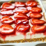 - 1 ½ cups graham cracker crumbs - ⅓ cup sugar - ½ cup unsalted butter, melted - 2 cups cream cheese, softened - 1 cup powdered sugar - 1 teaspoon vanilla extract - 1 cup heavy whipping cream - 2 cups fresh strawberries, hulled and sliced - ¼ cup strawberry jam Using fresh, ripe strawberries is key. Look for bright red berries with no soft spots. Choose high-quality cream cheese for a rich taste. I prefer unsalted butter for better control over sweetness. Use pure vanilla extract for the best flavor. You can swap graham cracker crumbs with crushed cookies or even nuts for a twist. If you need a dairy-free option, use a plant-based cream cheese. For the sweetener, maple syrup or honey can replace powdered sugar. Use a different fruit jam if you want to change the flavor. Start by mixing graham cracker crumbs, sugar, and melted butter in a bowl. Use a fork to combine them well. This mix should be crumbly but stick together when pressed. Next, take a 9x9 inch baking dish. Press the crumb mixture firmly into the bottom. Make sure it is even. Now, place the dish in the fridge while you make the filling. In a large bowl, beat the softened cream cheese until it is smooth. Add the powdered sugar and vanilla extract slowly. Keep beating until the mix is creamy and well combined. In a different bowl, whip the heavy cream until stiff peaks form. Gently fold the whipped cream into the cream cheese mix. This step adds lightness to your filling. Now it’s time to build your bars. Spread half of the cheesecake filling over the crust. Next, layer half of the sliced strawberries on top. Spoon half of the strawberry jam over the berries. Then, add the rest of the cheesecake filling on top. Finally, add the remaining strawberries and jam. This creates tasty layers. Cover the baking dish with plastic wrap. Place it in the fridge for at least 4 hours to set. For the best flavor, leave it overnight. When ready to serve, lift the bars out of the dish. Cut them into squares. Enjoy them chilled for a refreshing treat! To get that perfect no-bake texture, keep these tips in mind: - Use soft cream cheese. It blends easier, making your filling smooth. - Whip the cream well. You want stiff peaks for a light texture. - Fold gently. This helps keep the air in the whipped cream. - Chill long enough. Let it sit for at least four hours, or better, overnight. For a stunning presentation, I suggest adding a few finishing touches: - Top with strawberries. Place a fresh slice on each bar for color. - Drizzle with jam. A bit of strawberry jam adds shine and flavor. - Use a clean knife. Wipe the knife after each cut for neat slices. - Serve on a nice plate. A beautiful plate makes it more inviting. Avoid these common mistakes for the best results: - Skipping the chilling step. Don’t rush this; it’s key to setting. - Overmixing the cream. This can make it grainy instead of fluffy. - Not pressing the crust firmly. A loose crust will crumble when cut. - Using cold cream cheese. Cold cheese makes mixing harder and lumpy. {{image_2}} You can switch up the fruit on these bars easily. Try using blueberries or raspberries. Both fruits add a nice tartness. You can also use sliced peaches or even bananas for a fun twist. The key is to pick fruits that pair well with cream cheese. Fresh fruit keeps the bars bright and tasty. For a different flavor, you can change the vanilla extract. Use almond extract for a nutty taste. You can also add lemon zest for a fresh citrus kick. If you love chocolate, mix in cocoa powder or melted chocolate. These changes make the cheesecake just as creamy and delicious. To make this recipe gluten-free, swap graham crackers for gluten-free ones. Use almond flour or oat flour for the crust. For a vegan option, try using coconut cream instead of cream cheese. You can also use a dairy-free whipped cream. These swaps keep the bars rich and smooth without animal products. To store leftover strawberry shortcake cheesecake bars, place them in an airtight container. Keep them in the refrigerator. They will stay fresh for about 3 to 5 days. If you want to keep them longer, consider freezing. You can freeze these cheesecake bars for up to 2 months. First, cut them into squares. Then, wrap each piece tightly in plastic wrap. Place the wrapped bars in a freezer-safe bag or container. Make sure to label it with the date. To keep your cheesecake bars fresh, always use clean utensils when serving. Avoid leaving them out at room temperature for too long. If possible, serve them chilled right from the fridge. This will keep the texture creamy and delicious. Enjoy them cold for the best taste! Yes, you can make these cheesecake bars ahead of time. They taste great after chilling in the fridge. I suggest making them the night before. This way, the flavors blend well together. Just cover them with plastic wrap before chilling. The cheesecake bars are set when they feel firm to the touch. After at least four hours in the fridge, check if they hold their shape. You can also use a toothpick. If it comes out clean, they are ready. Yes, you can use frozen strawberries if fresh ones are not available. Just thaw them first and drain any extra juice. This helps keep the bars from becoming too watery. The flavor will still be delicious! These bars pair well with whipped cream or a scoop of vanilla ice cream. You can also add more fresh strawberries on top. A drizzle of chocolate sauce adds a fun twist too! This blog post covered the key steps to make delicious cheesecake bars. We discussed the best ingredients, how to prepare them, and shared tips for perfect results. You learned about variations to suit your taste and how to store leftovers properly. Making cheesecake bars can be fun and easy. Use the tips here to impress your friends and family. Enjoy experimenting with flavors, and remember to avoid common mistakes. With practice, you’ll master this treat and delight everyone who tries it.
