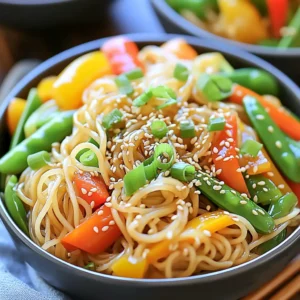For this dish, I like to use whole wheat noodles. They add a nice, nutty flavor. You can also use rice noodles, egg noodles, or any noodles you prefer. Just cook them according to the package directions. The sauce is where the magic happens! Here’s what you need: - 2 tablespoons sesame oil - 4 cloves garlic, minced - 2 tablespoons soy sauce (use low sodium if you want) - 1 tablespoon rice vinegar - 1 tablespoon honey or maple syrup - 1 teaspoon freshly grated ginger Mix these ingredients well. The sesame oil gives a rich taste, while the garlic adds depth. The soy sauce brings saltiness, and the vinegar adds zing. Honey or maple syrup balances the flavors perfectly. To make your dish pop, add these garnishes: - 1/4 cup green onions, chopped - 2 tablespoons toasted sesame seeds - Optional: 1 cup mixed vegetables like bell peppers or snap peas These toppings not only look great, but they also add crunch and freshness. Just sprinkle them over your noodles before serving. Enjoy the colors and flavors! Start by boiling water in a pot. Once it bubbles, add 8 oz. of whole wheat noodles. Cook them according to the package instructions. This usually takes about 7-9 minutes, depending on your noodles. Once done, drain the noodles in a colander. Set them aside for now. In a small bowl, mix the sauce. First, add 2 tablespoons of sesame oil. Then, add 4 cloves of minced garlic. Next, pour in 2 tablespoons of soy sauce. If you want it lighter, use low-sodium soy sauce. Follow this with 1 tablespoon of rice vinegar. Add 1 tablespoon of honey or maple syrup for sweetness. Finally, mix in 1 teaspoon of freshly grated ginger. Whisk all these ingredients until they blend well. Heat a skillet or wok on medium heat. Pour in a teaspoon of sesame oil. If you want veggies, add 1 cup of mixed vegetables, like bell peppers or snap peas. Sauté them for 2-3 minutes until they are slightly soft. Next, add the drained noodles to the skillet. Pour the garlic sesame sauce over the noodles. Toss everything gently so the noodles soak up the sauce. After that, stir in 1/4 cup of chopped green onions and 2 tablespoons of toasted sesame seeds. Serve warm in bowls and enjoy! To get the best noodle texture, cook them just right. Follow the package time closely. Overcooking makes them mushy. You want them slightly firm, also known as al dente. Drain the noodles well. This helps the sauce stick better. You can change the taste to fit your mood. Want it sweeter? Add more honey or maple syrup. For a sharper taste, add more rice vinegar. If you love garlic, add an extra clove or two. Taste the sauce before mixing it with the noodles. This way, you can adjust it to your liking. Prep makes cooking easier. Chop your garlic, green onions, and any veggies you want to add. You can mix the sauce in advance too. Store everything in the fridge in separate containers. This way, when you’re ready, you can cook in just minutes. Enjoy your quick meal without the fuss! {{image_2}} To make a vegan version of Minute Garlic Sesame Noodle Bowls, swap honey for maple syrup. This simple change keeps the dish plant-based. Ensure your noodles are also vegan-friendly. Choose whole wheat or rice noodles for a great texture. You can add tofu or edamame for extra protein. These options keep your meal filling and tasty. You can easily add protein to your noodle bowls. Try cooked chicken, shrimp, or beef for heartiness. If you want a vegetarian option, consider tempeh or seitan. These proteins pair well with garlic and sesame flavors. Simply cook them in the skillet before adding the noodles. This step enhances the dish's flavor while keeping it balanced. Customizing your vegetable mix makes these noodle bowls even better. Bell peppers, snap peas, and carrots are great choices. You can also add broccoli, zucchini, or mushrooms based on your taste. Just sauté the veggies for a few minutes to soften them. This extra step brings out their natural sweetness, making your bowl colorful and nutritious. To store leftover Minute Garlic Sesame Noodle Bowls, use an airtight container. Make sure the noodles cool down first. This helps avoid sogginess. Keep them in the fridge for up to three days. Label the container with the date. This way, you know when to eat them! When it’s time to eat your leftovers, reheat them carefully. You can use a microwave or a skillet. If using a microwave, place the noodles in a bowl. Add a splash of water to keep them moist. Heat in short bursts, stirring in between. For a skillet, add a bit of sesame oil. Heat on medium until warm. Stir gently to mix in any sauce that may have settled. Freezing is a great option for future meals. First, let the noodles cool completely. Then, place them in a freezer-safe bag. Remove as much air as possible before sealing. Noodles can last up to three months in the freezer. When you are ready to eat, thaw them in the fridge overnight. Reheat as described above for a quick meal. Yes, you can use many kinds of noodles. Rice noodles, egg noodles, or even ramen work well. Each noodle brings a unique taste and texture. Just remember to cook them according to their package instructions. This way, they will stay firm and not get mushy. To add heat, use crushed red pepper flakes. Start with a pinch and then taste. You can always add more if you like it hotter. Another option is to add fresh chili slices. For an unexpected kick, try a dash of sriracha sauce in the garlic sesame sauce. It adds a nice flavor and heat. If you don't have sesame oil, try olive oil or avocado oil. These oils will change the flavor slightly but still taste good. You can also use peanut oil for a nutty flavor. If you want a hint of sesame, mix in a bit of sesame seeds with your oil. This will mimic the taste of sesame oil and still keep your dish tasty. This article covered how to make a delicious noodle dish. We explored noodle types, sauces, and garnishes. You learned step-by-step instructions for cooking the noodles and making the sauce. I shared tips to perfect your dish and ideas for variations. Finally, we discussed storage and answered common questions. Now you have the tools to create this tasty meal your way. Enjoy experimenting with flavors and textures, and don’t be afraid to get creative!