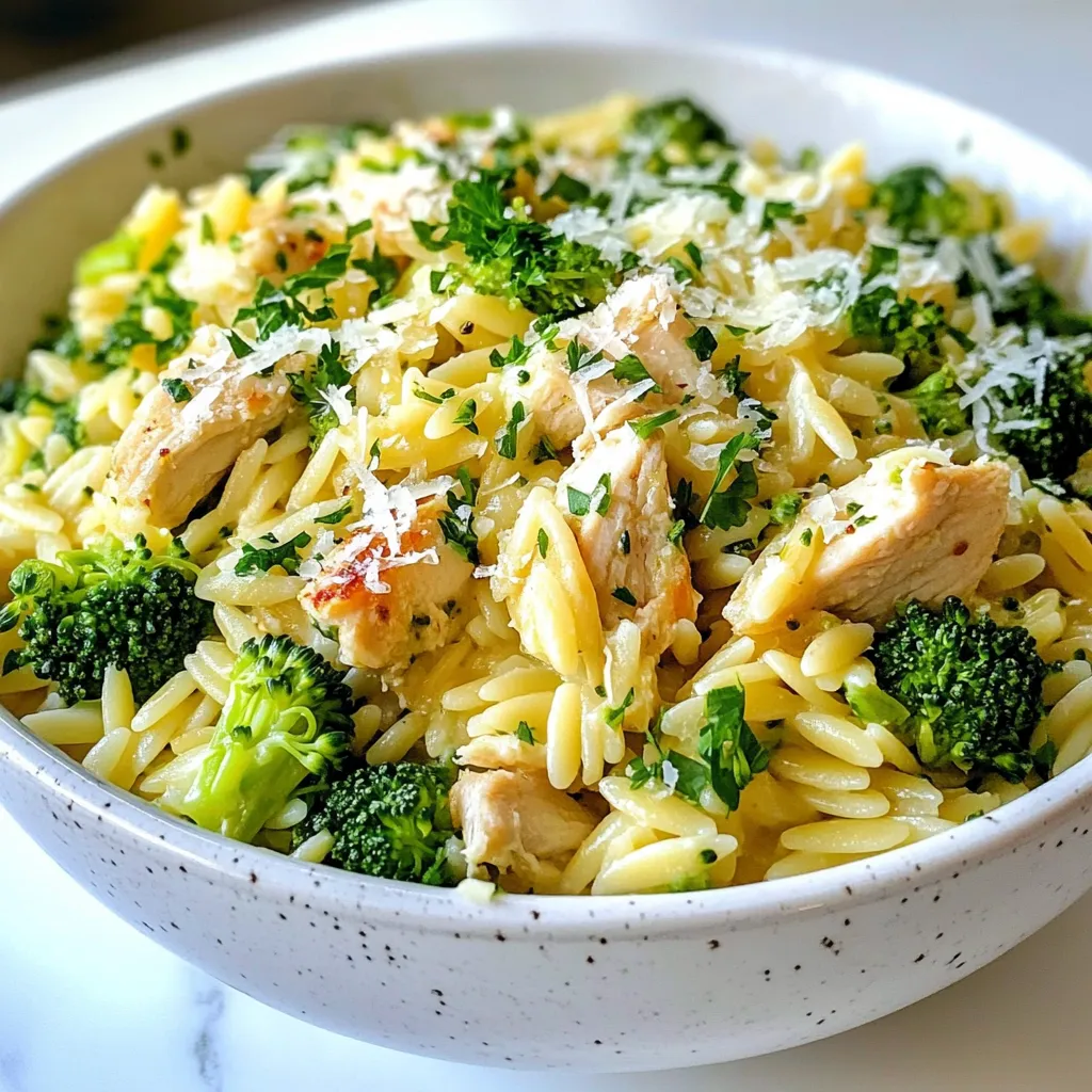 To make Chicken Broccoli Orzo, gather these ingredients: - 1 cup orzo pasta - 2 cups broccoli florets - 1 lb chicken breast, diced - 2 tablespoons olive oil - 2 cloves garlic, minced - 1 cup chicken broth - 1 tablespoon lemon juice - 1 teaspoon dried thyme - Salt and pepper to taste - ½ cup grated Parmesan cheese (optional) - Fresh parsley, chopped for garnish These ingredients blend well to create a hearty and tasty dish. The orzo gives a nice texture, while the chicken adds protein. Broccoli brings in color and nutrients. You can switch some ingredients if needed. Try using whole wheat orzo for a healthier option. You can also use vegetable broth instead of chicken broth. This keeps it tasty for vegetarians. If you want more flavor, add red pepper flakes for heat. For a creamier texture, consider adding cream cheese or ricotta cheese instead of Parmesan. Each serving of Chicken Broccoli Orzo has about: - Calories: 350 - Protein: 30g - Carbohydrates: 40g - Fat: 10g - Fiber: 5g This dish gives you a balanced meal with protein, carbs, and healthy fats. It’s perfect for lunch or dinner. Enjoy cooking and feel good about what you eat! {{ingredient_image_1}} To start, boil water in a large pot. Add 1 cup of orzo pasta, cooking it as the package says. About one minute before the orzo is done, toss in 2 cups of broccoli florets. Drain both and set them aside. Next, heat 2 tablespoons of olive oil in a large skillet over medium heat. Add 1 pound of diced chicken breast, seasoning it with salt, pepper, and 1 teaspoon of dried thyme. Cook the chicken for 5 to 7 minutes until it turns golden brown. Then, add 2 minced cloves of garlic to the skillet. Sauté it for one minute until it smells great. Pour in 1 cup of chicken broth and 1 tablespoon of lemon juice, scraping any bits stuck to the pan. Let this simmer for a bit. Now, add the cooked orzo and broccoli to the skillet, mixing everything well. Cook for another 2 to 3 minutes until it gets warm. If you want, sprinkle ½ cup of grated Parmesan cheese on top and stir until it melts. Adjust the taste with more salt and pepper if you need to. Serve this warm with fresh chopped parsley on top. To cook the orzo just right, keep an eye on the time. Overcooking can make it mushy. Add the broccoli one minute before draining the orzo. This way, the broccoli stays bright and crisp. When draining, shake the colander gently. This helps remove excess water without breaking the orzo or broccoli. If you want more flavor, try adding a pinch of salt to the boiling water before adding the orzo. For juicy chicken, start with diced chicken breast. This cuts down cooking time and helps keep it moist. Season it well with salt and pepper before cooking. Do not rush the cooking process. Stir the chicken occasionally for even cooking. When it turns golden, it’s ready. To check if it’s done, cut a piece in half. If it’s no longer pink, it’s perfect. Let it rest for a minute or two before adding it to the dish. This keeps it tender and juicy. One common mistake is overcooking the broccoli. If you cook it too long, it turns mushy. You want it bright green and crisp. Another mistake is not seasoning the chicken well. Salt and pepper bring out the flavor. Lastly, don’t forget to scrape the skillet. Those bits add great taste to the dish. You need a large pot for the orzo and a skillet for the chicken. A wooden spoon is great for stirring. A colander helps drain the orzo and broccoli easily. If you have a zester, use it for lemon juice. A good chef's knife makes chopping chicken and garlic easy. To make your Chicken Broccoli Orzo creamier, mix in more Parmesan cheese. You can also add a splash of heavy cream or milk. For extra flavor, try adding some red pepper flakes. A dash of soy sauce can also enhance the taste. Fresh herbs like basil or thyme give a bright touch too. Pro Tips Perfectly Cooked Orzo: Make sure to follow the package instructions for cooking orzo. Adding the broccoli in the last minute ensures both are perfectly cooked without overcooking the broccoli. Chicken Browning: For a delicious flavor, allow the chicken to brown well in the skillet. This caramelization adds depth to the dish. Customizable Add-Ins: Feel free to add other vegetables such as bell peppers or spinach for more color and nutrition. Just adjust the cooking time accordingly. Creamy Texture: If you want a creamier dish, consider adding a splash of heavy cream along with the chicken broth and cheese for an extra rich flavor. {{image_2}} To make a tasty vegetarian version, swap the chicken for chickpeas or tofu. Both options add protein and texture. Use vegetable broth instead of chicken broth. This keeps the dish rich and flavorful. You can also add some extra spices, like cumin or paprika, for depth. This version remains filling and nutritious while being meat-free. Feel free to get creative with your veggies! You can add bell peppers, carrots, or spinach. These give your dish a colorful look and boost nutrition. Just remember to chop them small for even cooking. Add these veggies when you cook the chicken. This way, they soak up all the flavors and taste amazing. You can enhance the flavor in many ways. Try adding a splash of soy sauce or a sprinkle of red pepper flakes for heat. For proteins, think about using shrimp or salmon instead of chicken. Both pair well with broccoli and orzo. You can also try nuts, like almonds or walnuts, for crunch. Each option brings a new taste to your Chicken Broccoli Orzo. After enjoying Chicken Broccoli Orzo, store any leftovers in an airtight container. This keeps the dish fresh and tasty. Let the orzo cool completely before sealing the container. If you leave it warm, it may create moisture inside. This moisture can make the orzo soggy. Store the leftovers in the fridge for up to three days. To reheat Chicken Broccoli Orzo, use a stovetop or microwave. If using the stovetop, place the orzo in a pan over low heat. Add a splash of chicken broth or water to keep it moist. Stir often until it heats through. If using the microwave, place the orzo in a microwave-safe bowl. Cover it with a damp paper towel. Heat in short bursts, stirring in between, until it is hot. You can freeze Chicken Broccoli Orzo for longer storage. Place it in a freezer-safe container or bag. Be sure to remove as much air as possible to prevent freezer burn. Label the container with the date. You can freeze it for up to three months. To thaw, move the container to the fridge overnight. Then, reheat it on the stovetop or microwave as mentioned above. Yes, you can use whole wheat orzo. Whole wheat orzo adds more fiber and nutrients. It has a nuttier taste, which pairs well with the dish. Just cook it according to package instructions. The cooking time may vary slightly, so check for doneness. Chicken Broccoli Orzo stands well on its own. However, you can serve it with: - A simple green salad - Garlic bread or rolls - Steamed vegetables like carrots or green beans - A light vinaigrette dressing for added zing These options balance the meal and add freshness. To make Chicken Broccoli Orzo in advance, follow these steps: 1. Cook the dish as directed and let it cool. 2. Store it in an airtight container in the fridge for up to three days. 3. To reheat, warm it on the stove over low heat. Add a splash of chicken broth to keep it moist. This way, you have a quick meal ready when you need it! You now have all you need to create a tasty Chicken Broccoli Orzo. We covered ingredients, cooking steps, and helpful tips. You can avoid common mistakes and explore fun variations too. Remember to store leftovers properly and reheat with care. This dish is simple to make and great for meal prep. Enjoy experimenting with flavors and sharing your results. Get cooking, and have fun with your meals!