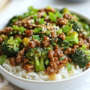 - 1 lb ground beef - 2 cups broccoli florets - 1 medium onion, finely chopped - 3 cloves garlic, minced - 1 tablespoon ginger, grated - 3 tablespoons soy sauce - 2 tablespoons oyster sauce - 1 tablespoon hoisin sauce - 1 teaspoon sesame oil - 1 tablespoon olive oil - Salt and pepper to taste - Cooked jasmine rice - Toasted sesame seeds - Chopped green onions This savory dish starts with ground beef and bright, fresh broccoli. The onion, garlic, and ginger add a depth of flavor. Ground beef is rich in protein, making it a great choice for a filling meal. Broccoli brings vitamins and a nice crunch. The sauces give the dish a savory kick. Soy sauce adds umami, while oyster sauce provides sweetness. Hoisin sauce adds a hint of spice and depth. Sesame oil gives a nutty flavor that ties everything together. Serve this dish over warm jasmine rice. The rice soaks up the tasty sauce. Top it off with toasted sesame seeds and chopped green onions for a beautiful finish. These garnishes add an extra layer of flavor and texture. {{ingredient_image_1}} Start by heating olive oil in a large skillet over medium-high heat. Add the finely chopped onion. Sauté it for about 3 to 4 minutes until it turns translucent. This step builds a strong base for your dish. Next, add the minced garlic and grated ginger. Cook for one more minute until it smells amazing. This mix of onion, garlic, and ginger creates a fragrant foundation that enhances the flavors of the beef and broccoli. Now, increase the heat to high and add the ground beef to the skillet. Cook the beef for about 4 to 5 minutes. Break it apart with a spatula as it cooks. You want it to brown evenly. If there’s extra fat, drain it off. Once the beef is browned, add the broccoli florets to the skillet. Stir everything together and cook for about 3 to 4 minutes. The broccoli should be bright green and tender-crisp. This texture is key; it adds both flavor and crunch. In a separate bowl, mix the soy sauce, oyster sauce, hoisin sauce, and sesame oil. Pour this mixture over the beef and broccoli in the skillet. Add salt and pepper to taste, then stir everything well. This sauce ties the dish together with savory goodness. To thicken the sauce, drizzle the cornstarch mixture over the stir-fry and mix thoroughly. Cook for an additional 2 minutes. This will give your dish a nice, glossy finish. Now, serve your savory beef and broccoli over cooked jasmine rice. Finish with toasted sesame seeds and chopped green onions for a pop of flavor and color. To make this dish truly shine, adjust the seasoning to your taste. Start with the sauces. I recommend using: - 3 tablespoons soy sauce - 2 tablespoons oyster sauce - 1 tablespoon hoisin sauce These ratios give a great balance of sweet and salty. You can add more or less based on your preference. Taste as you go. Cooking ground beef evenly is key. Use a large skillet and break the beef into small pieces as it cooks. This way, it browns nicely without clumping. For the broccoli, aim for tender-crisp. Cook it for about 3-4 minutes until it is bright green. It should still have a slight crunch. This keeps the flavor fresh and vibrant. Prep is crucial for a quicker meal. Chop your onion, garlic, and ginger ahead of time. You can store them in the fridge for easy access. Using pre-cooked rice can save you time. Just heat it while you cook the beef and broccoli. This way, your meal is ready in no time. Enjoy your cooking! Pro Tips Fresh Ingredients: Always use fresh broccoli and high-quality ground beef for the best flavor and texture in your dish. Cooking Time: Keep an eye on the broccoli while cooking; overcooking can lead to a mushy texture. Aim for bright green and tender-crisp. Custom Sauces: Feel free to adjust the sauce based on your taste preferences. Add more soy sauce for saltiness or hoisin for sweetness. Presentation: For a beautiful presentation, garnish your dish with toasted sesame seeds and chopped green onions just before serving. {{image_2}} You can switch out ground beef for other proteins. Ground turkey is a great choice. It has a light flavor that takes on any sauce well. Ground chicken works too. It’s lean and cooks quickly. For a plant-based option, try using tofu. Just press it to remove water, then crumble it before cooking. Each option brings its own flair. Want to boost the nutrition? Add more veggies to your dish! Carrots add a nice crunch. Bell peppers give sweetness and color. Snap peas offer a fresh taste. You can even throw in mushrooms for earthiness. The more, the merrier! Mix and match based on what you like. You can spice things up! To make your dish spicy, add red pepper flakes or sriracha. If you like sweet flavors, try adding a dash of honey or brown sugar. You can also mix in curry powder for an Indian twist. Experiment with flavors to find your favorite! Store any leftovers in an airtight container. This keeps the dish fresh. It is best to refrigerate within two hours. The dish will stay good for about three days. Make sure to let it cool before sealing. This helps avoid condensation inside the container. To freeze the dish, let it cool completely. Use a freezer-safe container or a heavy-duty freezer bag. This helps prevent freezer burn. Label with the date, so you know when to use it. Ground beef and broccoli can be frozen for up to three months. For best results, thaw it in the fridge overnight before reheating. Reheat the dish on the stove for even heating. Use a non-stick skillet on medium heat. Add a splash of water or broth to keep it moist. Stir often to avoid sticking. You can also microwave it, but stir halfway through. This keeps the texture nice and helps heat evenly. Enjoy your savory dinner delight! If you want to avoid soy sauce, try coconut aminos. It has a sweet flavor and works well. Another option is tamari, which is gluten-free. For a quick fix, mix beef broth with a bit of vinegar. This will give you a salty taste without soy. If you need a low-sodium choice, look for low-sodium soy sauce. Each option will change the flavor slightly, so try them to see what you like best. Yes, you can use fresh broccoli! Fresh broccoli has a brighter taste and a nice crunch. Just be sure to cut it into small florets for even cooking. You will need to adjust your cooking time. Fresh broccoli takes about 3-4 minutes to cook until bright green and tender-crisp. Keep an eye on it, so it doesn’t get too soft. This way, you’ll keep that great texture. To make this dish gluten-free, switch the soy sauce for gluten-free options like tamari or coconut aminos. Check the oyster sauce, as some brands add gluten. Choose a gluten-free oyster sauce or skip it altogether. You can also use a mix of beef broth and cornstarch to thicken the sauce. These swaps keep the flavors while making the dish safe for those who avoid gluten. This blog post covered a tasty dish made with ground beef and broccoli. You learned about the main ingredients, sauces, and how to add flavor. We discussed step-by-step cooking instructions and shared tips to save time. You can also explore variations with different proteins and vegetables. In the end, this dish is easy to make and full of flavor. Feel free to adapt it to your taste. Enjoy cooking and experimenting with this recipe!