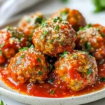 - 1 lb ground beef - 1/2 lb ground pork (or substitute with more beef) - 1/2 cup breadcrumbs - 1/4 cup grated Parmesan cheese - 1/4 cup fresh parsley, chopped - 1/4 cup onion, finely chopped - 2 garlic cloves, minced - 1 large egg for binding - 1 tsp dried oregano - 1 cup marinara sauce To make these meatballs melt in your mouth, start with the right mix of meats. I use ground beef and ground pork. The beef adds rich flavor, while the pork keeps them juicy. If you want, you can stick with just beef. Next, breadcrumbs help absorb moisture and add texture. Choose good quality breadcrumbs for the best results. For flavor, Parmesan cheese is key. It gives a salty bite that enhances every meatball. Fresh parsley adds a bright note. Use finely chopped onion and minced garlic to create depth. You need an egg to bind everything together. It keeps the meatballs from falling apart. Dried oregano brings a classic Italian taste. Finally, marinara sauce is essential. It adds moisture and a layer of flavor. Serve these meatballs with the sauce for a delicious meal. {{ingredient_image_1}} To start, grab a large mixing bowl. This is where the magic happens. Add the ground beef and ground pork. If you prefer, you can use all beef. Next, toss in the breadcrumbs, grated Parmesan cheese, fresh parsley, finely chopped onion, and minced garlic. Don't forget the egg, dried oregano, salt, and black pepper. Mix all these ingredients well, but be careful. You want to combine them without overworking the meat. Overmixing makes meatballs tough. Just stir gently until everything is blended. Now it's time to shape the meatballs. Aim for golf-ball-sized portions. Each meatball should be about 1.5 inches in diameter. This size cooks evenly and gives a nice bite. Use your hands to roll the mixture into round balls. Make sure they are smooth on the outside. You should end up with around 20 meatballs. If they stick to your hands, wet them slightly with water. This makes it easier to shape the meatballs. Next, heat a generous amount of olive oil in a large skillet over medium heat. Once the oil is hot, add the meatballs in batches. Don't crowd the pan; this helps them cook evenly. Cook each meatball for about 4 to 5 minutes on each side. They should turn a nice golden brown. Flip them carefully to keep them whole. Once browned, move them to a plate. Repeat this until all meatballs are cooked. Now, it's time for the sauce. Return all the browned meatballs to the skillet. Pour the marinara sauce over them. Stir gently to coat each meatball. Let the meatballs simmer in the sauce for 10 to 15 minutes. This step is key for flavor. The meatballs soak up the sauce and become even tastier. Serve them hot, and enjoy the melt-in-your-mouth goodness! To make meatballs that melt in your mouth, you must avoid overworking the meat. When you mix the meat too much, it gets tough. Just mix until the ingredients come together. Focus on the right ingredient ratios. Use equal parts ground beef and ground pork for a great flavor. If you prefer, you can stick with just beef. Pan-frying gives meatballs a nice crust. This method locks in flavor and keeps them juicy. Baking is another option, but it won’t give you that golden brown outside. Control the heat while cooking. Medium heat works best. Too high, and the outside burns before the inside cooks. Adding herbs and spices makes a big difference. Fresh parsley and dried oregano add great taste. Don’t skip the garlic either! Consider mixing meats for added flavor. Ground beef and pork together create a rich taste. You could also try ground turkey for a lighter option. Pro Tips Use Fresh Ingredients: Always opt for fresh herbs and garlic to enhance the flavor of your meatballs. Fresh ingredients make a noticeable difference in taste. Don’t Overmix: Mix the meat just until combined to keep the meatballs tender. Overmixing can lead to dense meatballs. Test for Seasoning: Before forming all the meatballs, cook a small patty to taste the seasoning. Adjust salt and pepper as necessary. Let Them Rest: After cooking, let the meatballs rest for a few minutes before serving. This allows the juices to redistribute and enhances the overall flavor. {{image_2}} You can easily change the meat in this recipe. Ground turkey or chicken works well. These options are lean and still tasty. If you need a vegetarian or vegan choice, try using lentils or chickpeas. You can mash them and mix them with breadcrumbs and spices. This will keep the meatball shape while adding great flavor. While marinara sauce is classic, other sauces can be fun, too! You can use pesto for a fresh twist. A creamy Alfredo sauce can also make your meatballs rich and delicious. For a spicy kick, try arrabbiata sauce. Each sauce adds new flavors and makes the meal feel special. Meatballs pair well with many sides. Serve them over spaghetti for a classic meal. You can also enjoy them in a sub sandwich with cheese. For a lighter option, serve them with a salad or steamed veggies. Meatballs can even be a snack with toothpicks. The options are endless! To store cooked meatballs, let them cool first. Place them in an airtight container. Make sure to cover them well. You can keep cooked meatballs in the fridge for up to three days. For best results, eat them within two days. When you have leftovers, it’s smart to use them quickly. Reheat meatballs in the microwave or on the stove. Add a little marinara sauce to keep them moist. You can freeze both uncooked and cooked meatballs. If you freeze uncooked meatballs, place them on a tray first. Once frozen, move them to a bag. This prevents them from sticking together. Uncooked meatballs last for about three months in the freezer. If you freeze cooked meatballs, let them cool before packing. Store them in an airtight container or a freezer bag. Cooked meatballs can also last about three months. For thawing, move them to the fridge overnight. If you need them fast, use the microwave. Reheat them fully in a pan or microwave until hot. Cooked meatballs can last in the fridge for three days. If they sit longer, they may spoil. Signs of spoilage include a bad smell or slimy texture. If you see any mold, throw them away right away. For frozen meatballs, check them after three months. They may still be safe after this time, but taste and quality can suffer. Always check for any signs of freezer burn before using. The secret to tender meatballs lies in a few key ingredients. - Ground beef: Use a mix of ground beef and ground pork for flavor and moisture. - Breadcrumbs: They soak up the juices and keep the meatballs soft. - Egg: It binds the mix and adds moisture. - Parmesan cheese: This adds flavor and fat, enhancing tenderness. - Onion and garlic: These add moisture and flavor, making the meatballs juicy. Mix your ingredients gently. Overmixing can lead to tough meatballs. Yes, you can make meatballs in advance. - Preparation: Shape the meatballs and place them on a baking sheet. - Storage: Cover and refrigerate for up to 24 hours. - Freezing: You can freeze them for longer storage. Freeze them on a baking sheet first, then transfer to a bag. This way, you can cook them when you’re ready. To keep meatballs from falling apart, use proper binding techniques. - Egg: Always include an egg to help bind the mixture. - Breadcrumbs: Use enough breadcrumbs to absorb moisture. - Mix gently: Combine the ingredients without overworking the meat. Shape them firmly but not too tight. There are many great pairings for these meatballs. - Spaghetti: Serve them over a bed of spaghetti and top with marinara. - Garlic bread: This adds a crunchy side that balances the meal. - Salad: A fresh salad can lighten the meal and add crunch. - Polenta: Creamy polenta pairs beautifully with the meatballs. Choose any of these sides to enhance your meal! In this post, we explored making delicious meatballs, starting with key ingredients like ground beef, pork, and breadcrumbs. I shared essential steps for mixing, shaping, and cooking the meatballs perfectly. Tips for texture and flavor changes were also provided. Don't forget the enjoyment of serving them with pasta or bread. Experiment with variations and find your favorite. By following these steps, you'll create meatballs that impress and satisfy. Your cooking journey can always be exciting; keep it fresh and fun!